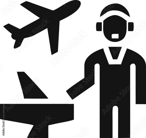 Air traffic ground crew communicates with aircraft using a headset near the runway