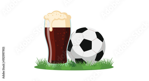 A tall glass filled with dark, frothy beer stands firmly on a patch of vibrant green grass, positioned next to a classic soccer ball.