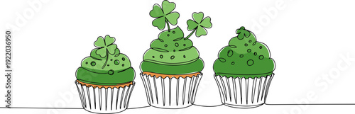Three green cupcakes decorated with shamrocks, isolated on a transparent background, perfect for St. Patrick's Day festivities or baking themed projects.