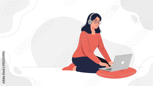 Young woman working on laptop with headphones, remote work concept