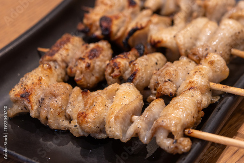 Fotografía Barbecue chicken skin on skew.