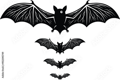 Black silhouette collection of four flying bats with detailed wings in various sizes isolated on white background for Halloween decor and spooky gothic design