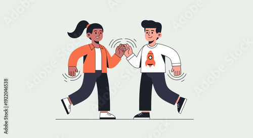 Two diverse friends giving each other a high five in a happy, friendly gesture
