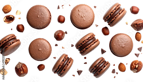 Overhead shot of chocolate macarons with chocolate filling, mixed with nuts and chocolate chips