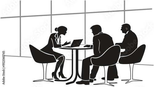 Professionals collaborating in modern office setting with laptop