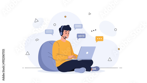 Young man with headset and laptop, working remotely and communicating online