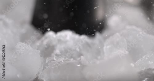 Super slow motion, Dramatic Monochrome Visual Demonstrates Ice Crystals Collapsing With Artistic Elegance