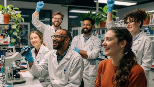Diverse group of scientists in a modern laboratory celebrating a successful discovery or experiment