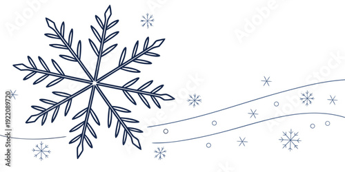 A beautifully intricate snowflake with a wavy line and small snowflakes
