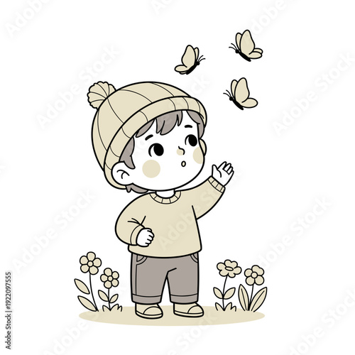 Curious little boy watching butterflies fly in a sunny garden with flowers