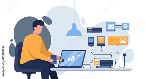 Man working on computer with connected devices and network equipment.