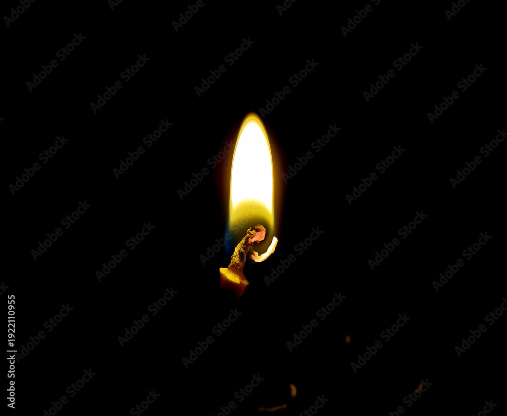 Fototapeta premium Macro Shot of a Glowing Candle Flame
