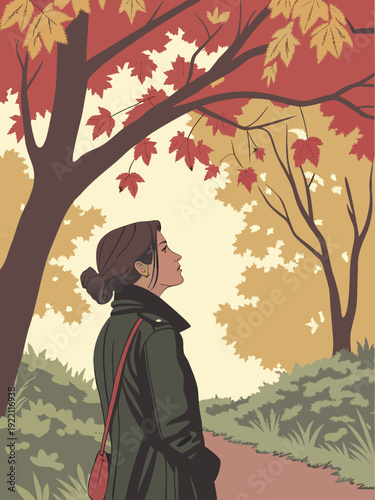 Woman admiring autumn leaves in a park.