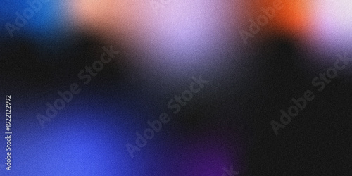 Photos A modern abstract background with a grainy, noisy texture, featuring a smooth gradient of deep blue, purple, warm peach, and burnt orange against a dark base