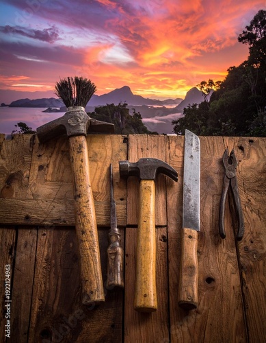 Wallpaper Mural Tools of the Trade - A Rustic Collection Against a Sunset Backdrop. Torontodigital.ca