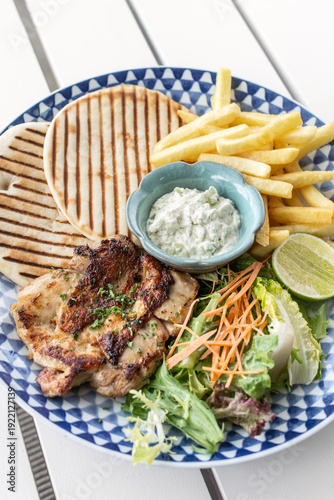 Wallpaper Mural grilled chicken breast with porario fries and salad meal Torontodigital.ca