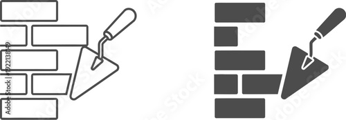 Trowel icon rests against a flat brick wall illustration showing construction work in progress.