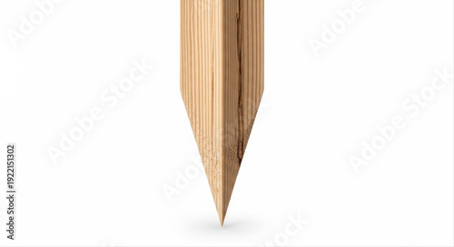 Wooden garden stake with pointed tip isolated on white background, showcasing natural grain and texture, perfect for landscaping and gardening projects
