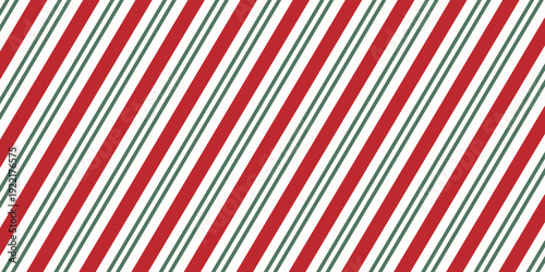 Christmas seamless pattern with a classic candy cane design with alternating red and green diagonal stripes on a white background, perfect for festive holiday themes.