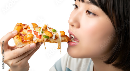 Young Woman Enjoying a Delicious Slice of Pizza