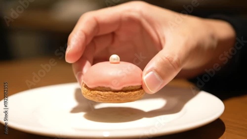 Hand Picking Small Pastry Bite Mid Shot Sweet Bakery Snack