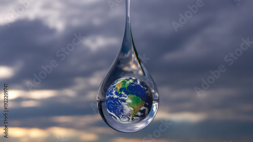 Earth inside a single water droplet against a cloudy stormy sky with sunlight peeking through
