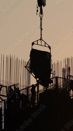 Heavy construction crane lifting material at Kai Tak Sports Park.