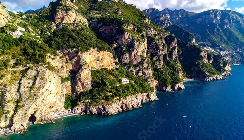 A serene coastal landscape with rugged cliffs and calm blue waters