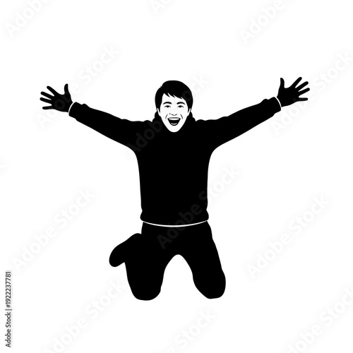 A silhouette of a man jumping with arms outstretched in joy