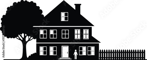 Black and white of a two-story house with a tree and a person standing at the door windows