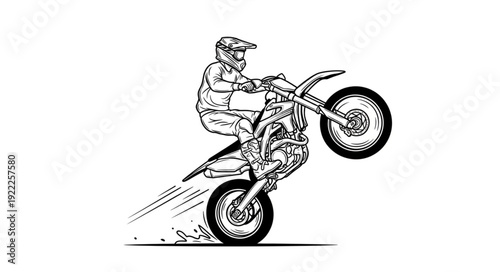 Motocross rider performing a wheelie on a dirt bike.