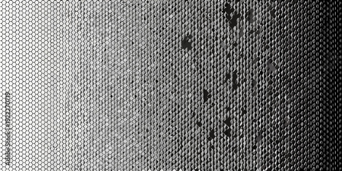 Abstract grayscale texture with a gradient and scattered dark imperfections