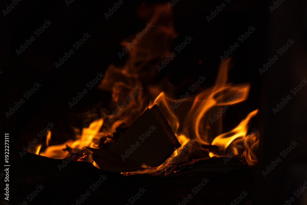 Fototapeta premium The moment the paper money burned fiercely inside the incense burner