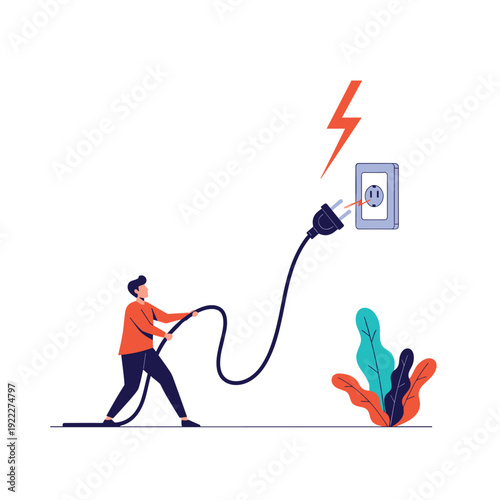 Determined man pulls a long black power cable across the floor in an attempt to reach an electrical wall socket for power and energy.