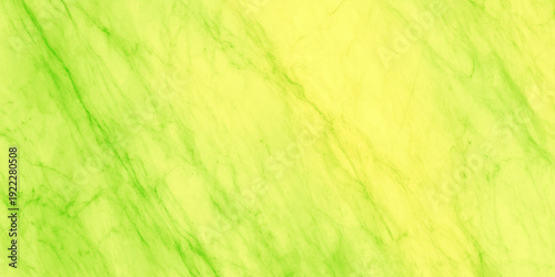 An abstract background featuring smooth flowing shades of vibrant green and pale yellow hues creating a soft texture
