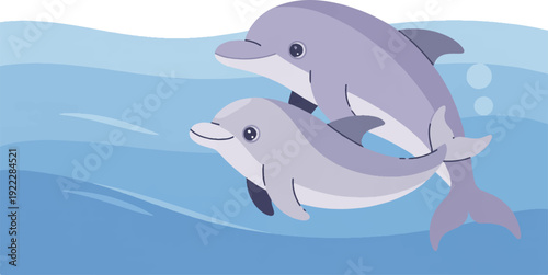 Two gray dolphins swimming together in the ocean with a calm sea and clear blue water