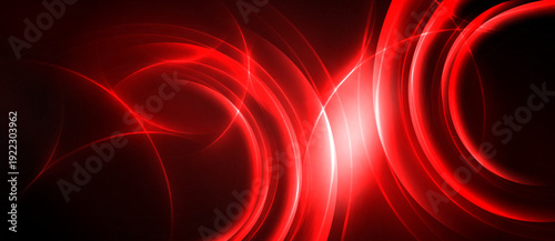 Abstract red light streaks, curves, energy flow. Dark background emphasizes bright illumination, dynamic composition.