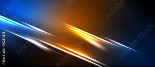 Abstract light streaks intersect dark background. Blue, orange hues create dynamic visual effect. Brightness contrasts sharply with shadows.
