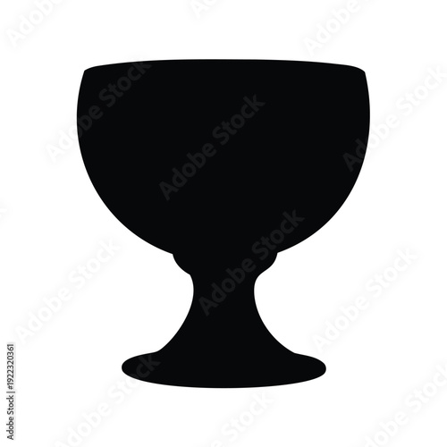 Black silhouette of goblet or chalice against a white background