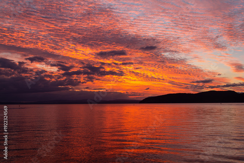 Wallpaper Mural Sunset sky with Altostratus Undulatus wavy stripy clouds at Lake Taupō, New Zealand. Whangamatā Bay, Kinloch. Torontodigital.ca