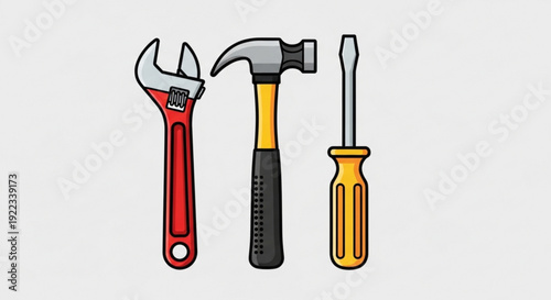 Set of essential hand tools including wrench hammer and screwdriver on gray background for diy projects and repairs