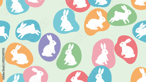 Seamless pattern of white rabbit silhouettes inside colorful organic blobs, creating a playful Easter and spring-themed background for children's designs.