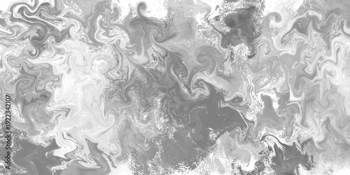 Abstract Gray Fluid Art: A captivating display of swirling gray hues creates a mesmerizing effect, evoking a sense of fluid movement and artistic expression.