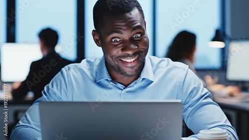 Man Working on Laptop in Office.