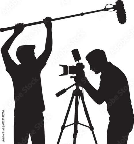Silhouette of Cameraman and Boom Operator Filming a Scene