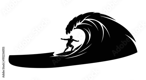 Surfer riding massive wave in dynamic ocean motion