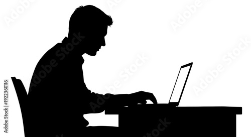 Man working on laptop in silhouette with modern workspace