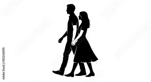 Silhouettes of young couple walking hand in hand together