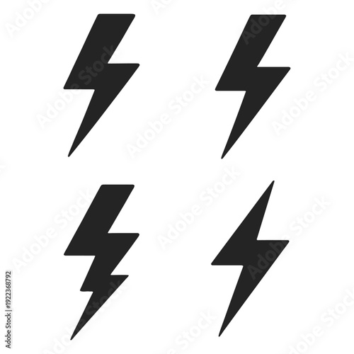 A dramatic black background with four gray lightning bolts