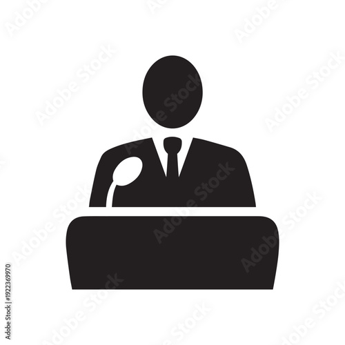 Man in Suit in front of Microphone on white background
